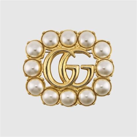 เข็มกลัด gucci|เข็มกลัด Pearl Double G brooch inโลหะสีทอง .